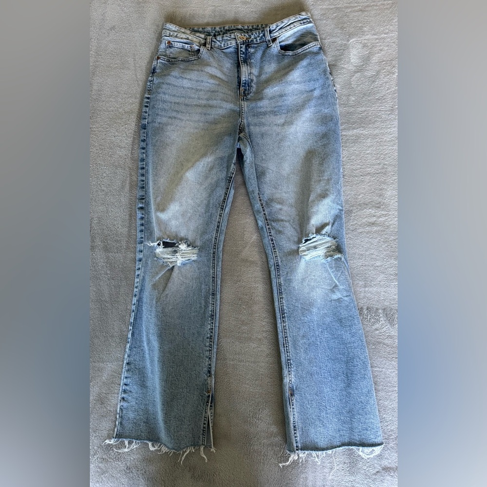 INC International Concepts Light Blue Jeans with Knee Rips and cut off hem